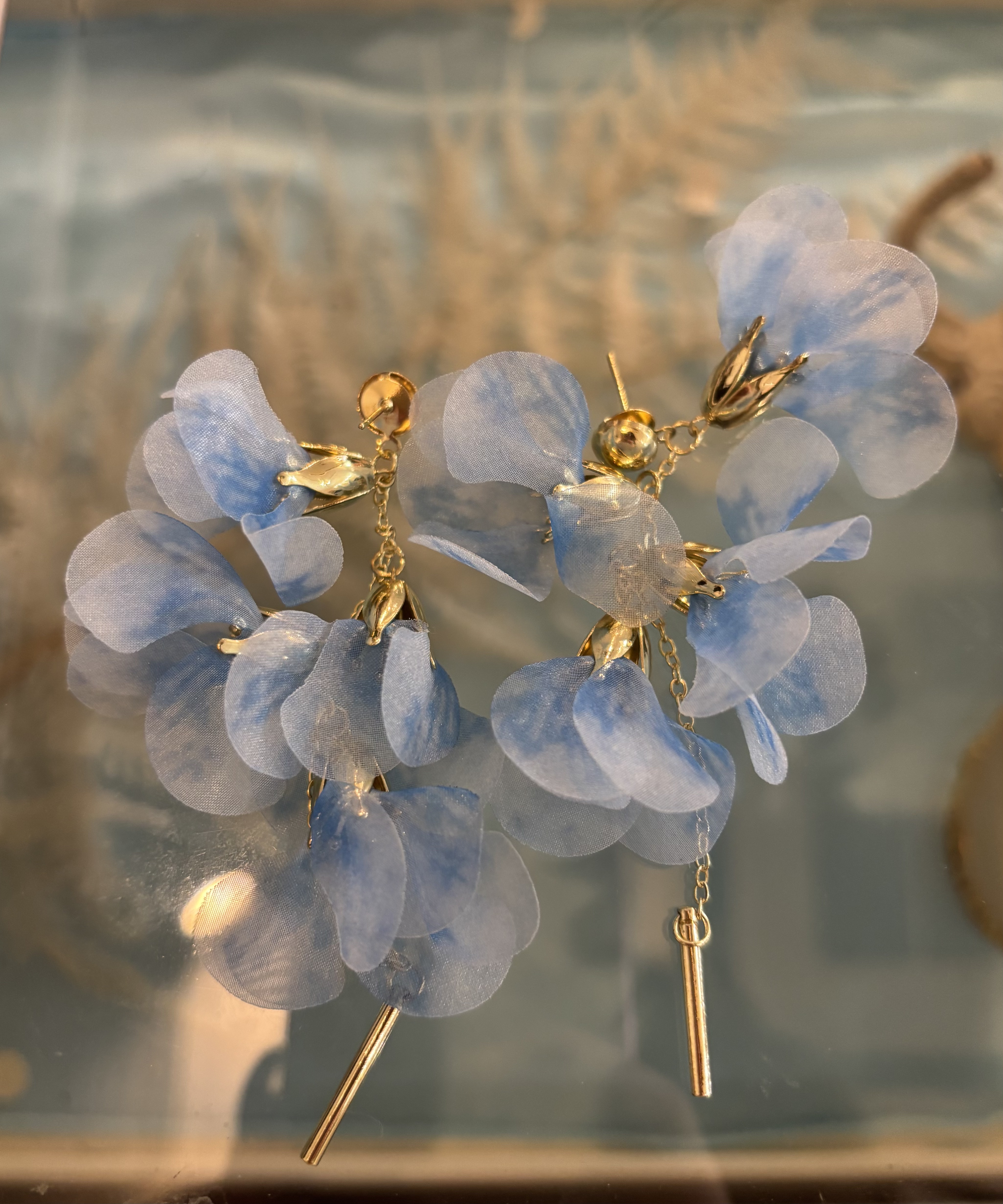 ブルーのお花４つピアス